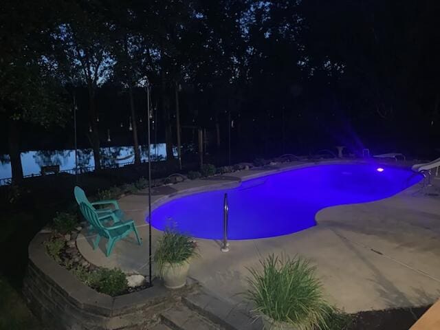 4680 Lovegrass Ln, Crestview, FL 32539 - view of swimming pool with a patio and a water slide