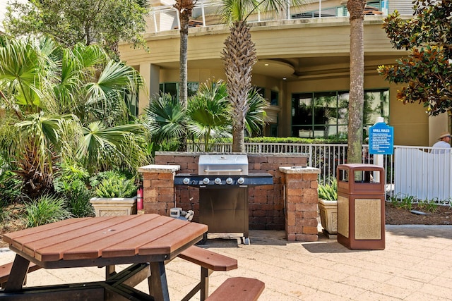 14701 Front Beach Rd Unit 1331, Panama City Beach, FL 32413 - view of patio featuring grilling area and outdoor dining area