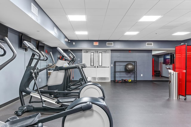14701 Front Beach Rd Unit 1331, Panama City Beach, FL 32413 - exercise room featuring a paneled ceiling and baseboards