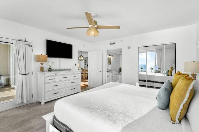 14701 Front Beach Rd Unit 1331, Panama City Beach, FL 32413 - carpeted bedroom with ensuite bathroom and a ceiling fan