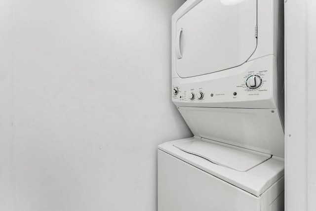 14701 Front Beach Rd Unit 1331, Panama City Beach, FL 32413 - laundry room featuring stacked washer and clothes dryer