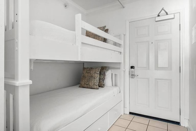 14701 Front Beach Rd Unit 1331, Panama City Beach, FL 32413 - bedroom featuring ornamental molding and light tile patterned floors