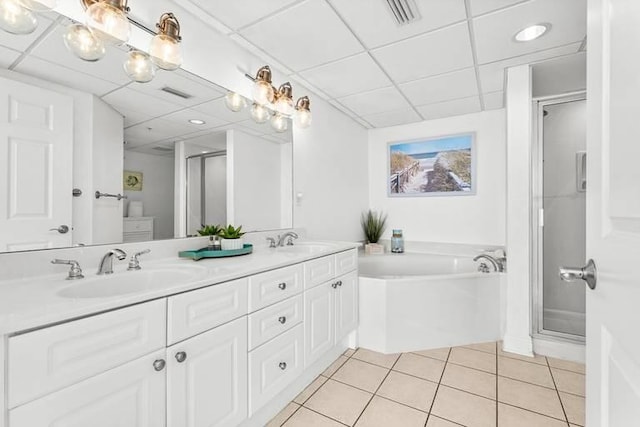 14701 Front Beach Rd Unit 1331, Panama City Beach, FL 32413 - full bathroom featuring a drop ceiling, double vanity, a stall shower, tile patterned flooring, and a bath