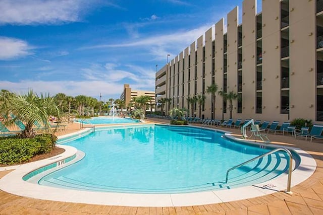 14701 Front Beach Rd Unit 1331, Panama City Beach, FL 32413 - community pool featuring a patio