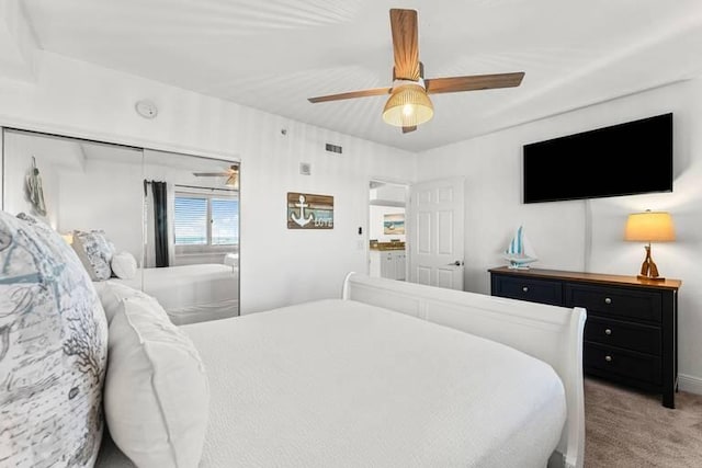 14701 Front Beach Rd Unit 1331, Panama City Beach, FL 32413 - bedroom with carpet flooring, a ceiling fan, and a closet