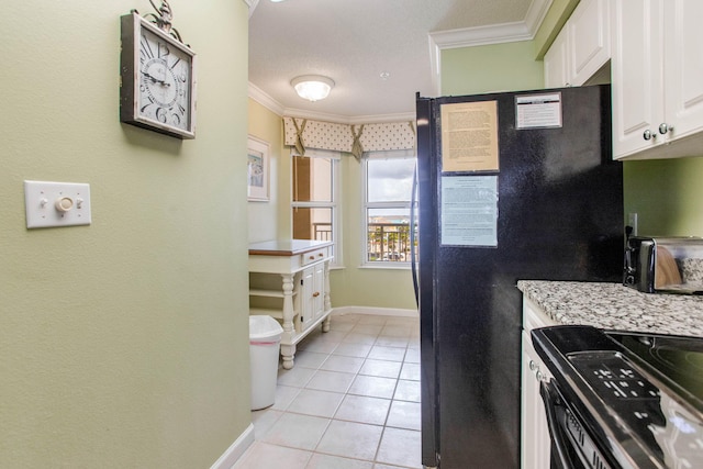 8499 Gulf Blvd Unit 303, Navarre, FL 32566 - kitchen featuring ornamental molding, white cabinetry, light tile patterned floors, and electric range oven