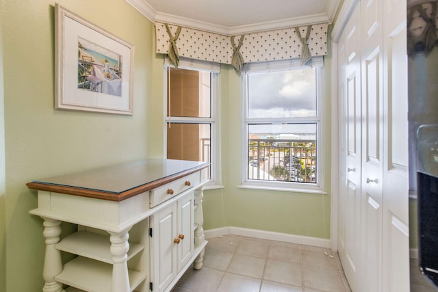 8499 Gulf Blvd Unit 303, Navarre, FL 32566 - interior space with crown molding and light tile patterned flooring