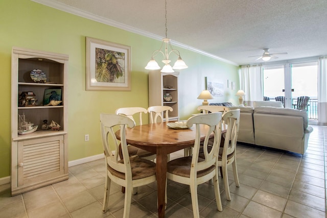 8499 Gulf Blvd Unit 303, Navarre, FL 32566 - dining room with crown molding, ceiling fan, light tile patterned floors, and a textured ceiling