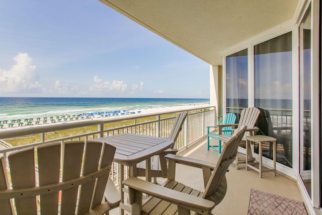8499 Gulf Blvd Unit 303, Navarre, FL 32566 - balcony featuring view of water and beach