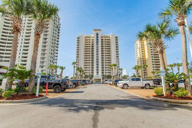 8499 Gulf Blvd Unit 303, Navarre, FL 32566 - view of building exterior featuring uncovered parking