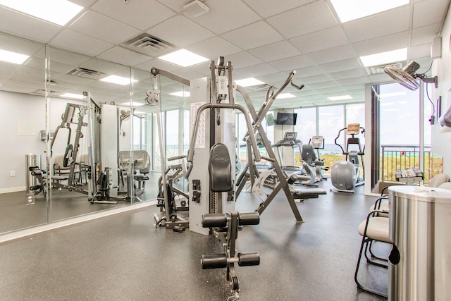 8499 Gulf Blvd Unit 303, Navarre, FL 32566 - exercise room with expansive windows and a drop ceiling