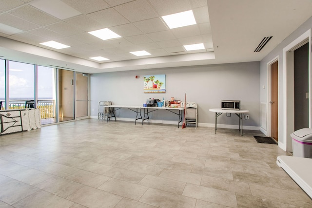 8499 Gulf Blvd Unit 303, Navarre, FL 32566 - misc room with a drop ceiling and baseboards