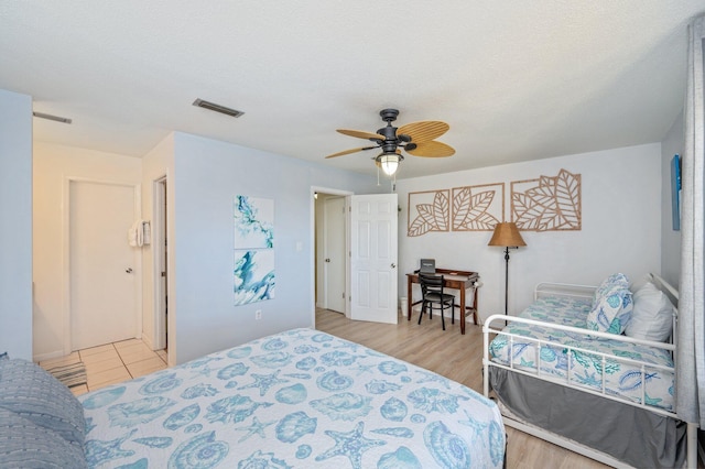 208 3rd St Unit J, Fort Walton Beach, FL 32548 - bedroom featuring a ceiling fan and wood finished floors