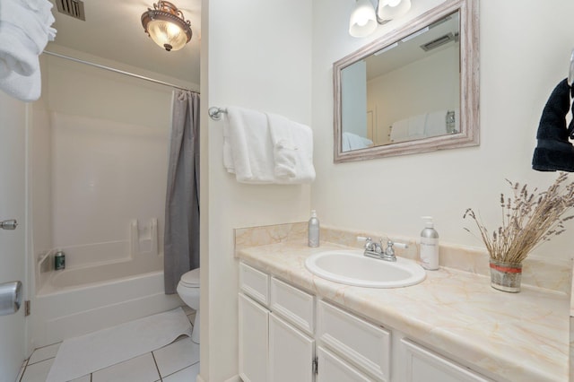 208 3rd St Unit J, Fort Walton Beach, FL 32548 - bathroom featuring tile patterned floors, vanity, toilet, and shower / bath combo with shower curtain