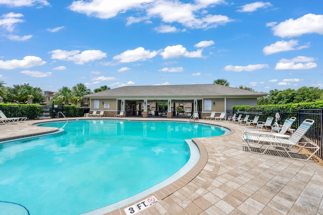 2131 Wilsons Plover Cir, Navarre, FL 32566 - community pool featuring a patio area