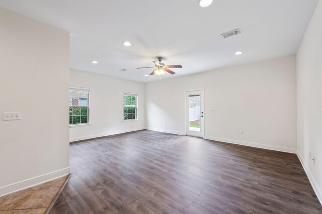 2131 Wilsons Plover Cir, Navarre, FL 32566 - spare room with a ceiling fan, dark wood-type flooring, baseboards, and recessed lighting