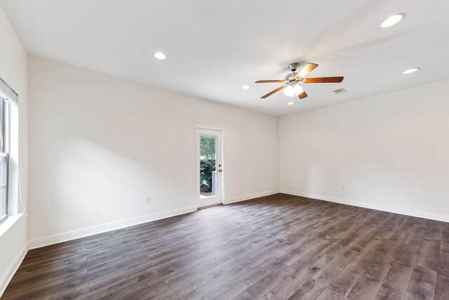 2131 Wilsons Plover Cir, Navarre, FL 32566 - unfurnished room with ceiling fan, dark wood-style flooring, recessed lighting, and baseboards