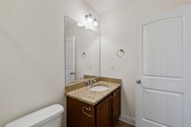 2131 Wilsons Plover Cir, Navarre, FL 32566 - bathroom featuring vanity and toilet
