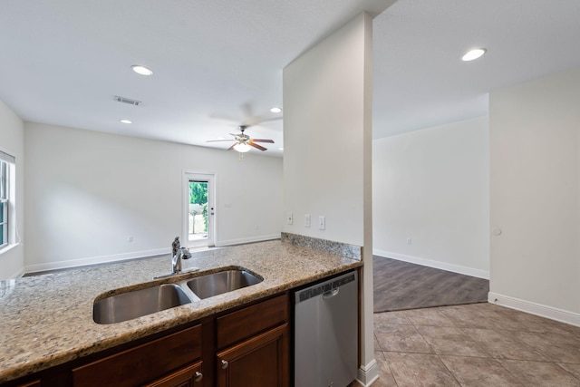 2131 Wilsons Plover Cir, Navarre, FL 32566 - kitchen featuring dishwasher, a sink, light stone countertops, recessed lighting, and ceiling fan
