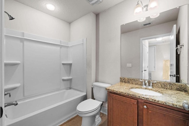 2131 Wilsons Plover Cir, Navarre, FL 32566 - full bath featuring vanity, toilet, shower / tub combination, a textured ceiling, and baseboards