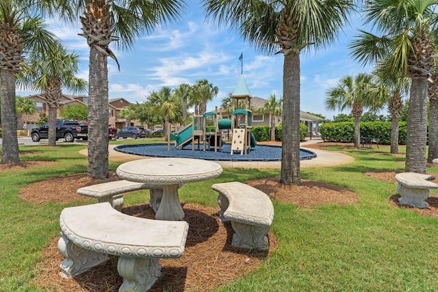 2131 Wilsons Plover Cir, Navarre, FL 32566 - communal playground with a lawn