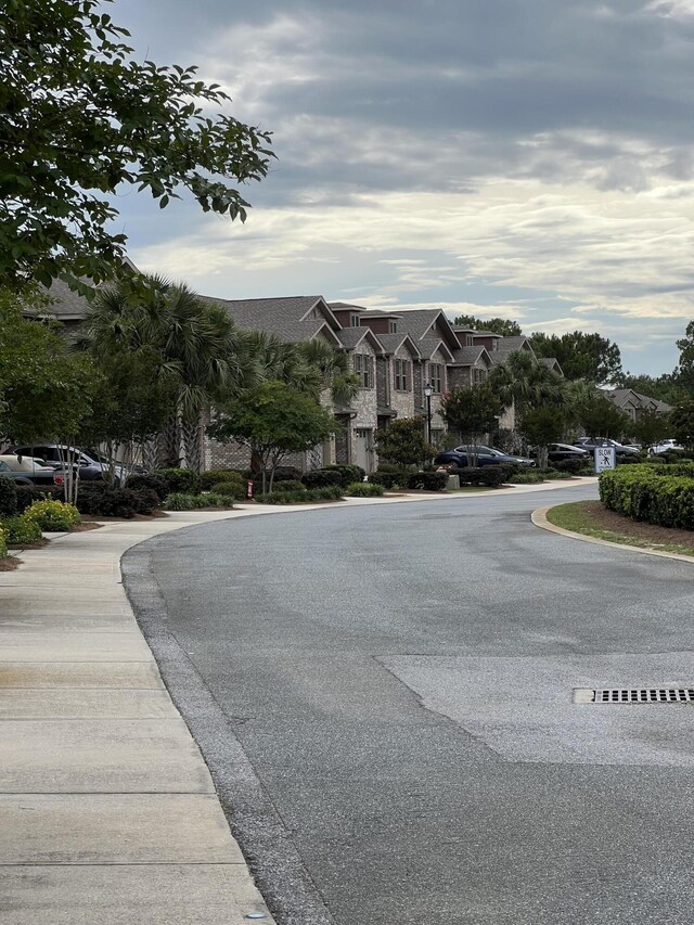 2131 Wilsons Plover Cir, Navarre, FL 32566 - view of asphalt street with a residential view and sidewalks