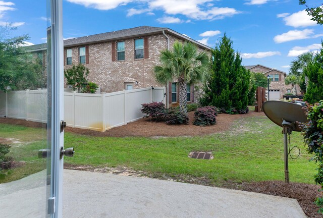 2131 Wilsons Plover Cir, Navarre, FL 32566 - view of front of home with brick siding