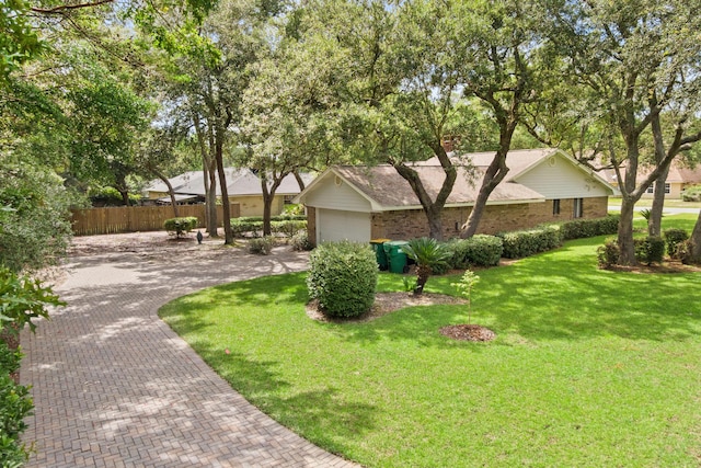 1127 Muirfield Way, Niceville, FL 32578 - view of front facade featuring brick siding and a chimney