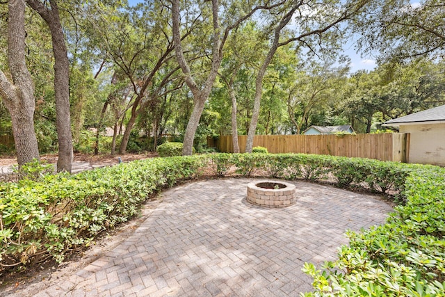 1127 Muirfield Way, Niceville, FL 32578 - view of patio / terrace featuring a fire pit