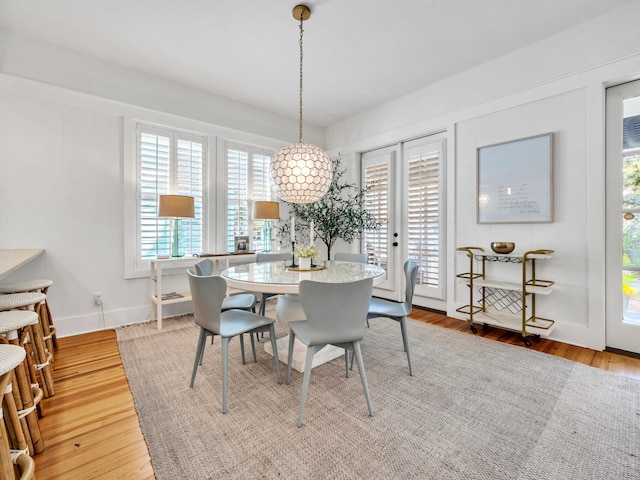 125 Silver Laurel Way, Santa Rosa Beach, FL 32459 - dining room with wood finished floors and baseboards