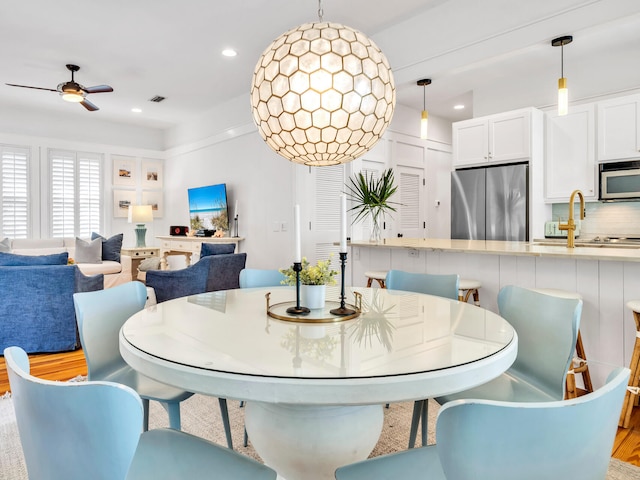 125 Silver Laurel Way, Santa Rosa Beach, FL 32459 - dining area with ceiling fan, recessed lighting, and light wood finished floors