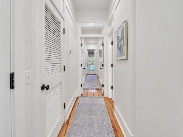 125 Silver Laurel Way, Santa Rosa Beach, FL 32459 - hallway featuring light wood-style flooring and baseboards