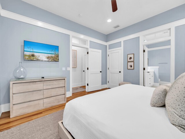 125 Silver Laurel Way, Santa Rosa Beach, FL 32459 - bedroom featuring wood finished floors, recessed lighting, ceiling fan, and ensuite bath