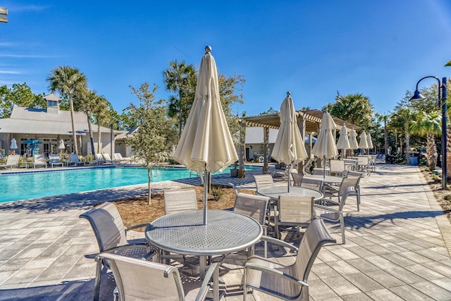 125 Silver Laurel Way, Santa Rosa Beach, FL 32459 - community pool with outdoor dining area and a patio