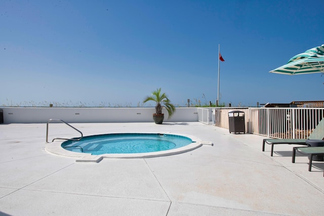 291 Scenic Gulf Dr Unit 201, Miramar Beach, FL 32550 - view of pool featuring a hot tub and a patio