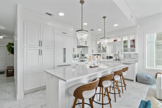 206 Henderson Resort Way Unit 5401, Destin, FL 32541 - kitchen featuring light marble finish floors, dishwasher, a chandelier, glass insert cabinets, and recessed lighting