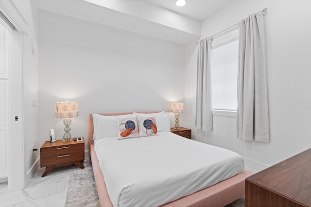 206 Henderson Resort Way Unit 5401, Destin, FL 32541 - bedroom with light marble finish floors and baseboards