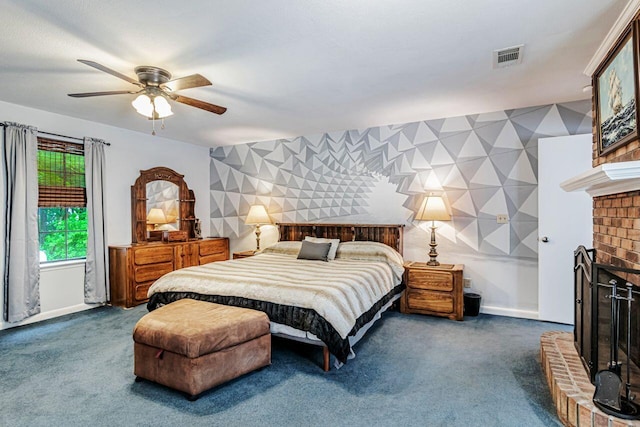 3544 State Highway 85, Laurel Hill, FL 32567 - bedroom with an accent wall, a brick fireplace, carpet, a ceiling fan, and wallpapered walls