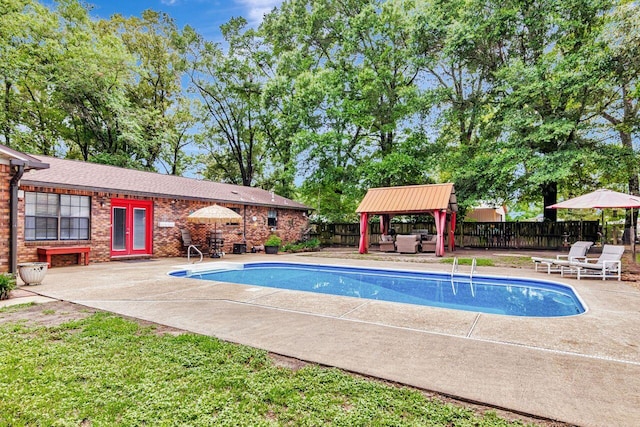3544 State Highway 85, Laurel Hill, FL 32567 - view of swimming pool featuring a gazebo, a fenced backyard, an outdoor living space, and a patio area