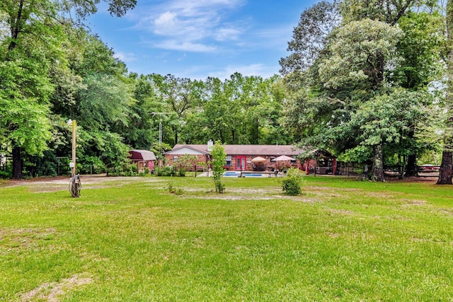 3544 State Highway 85, Laurel Hill, FL 32567 - view of yard featuring an outdoor pool
