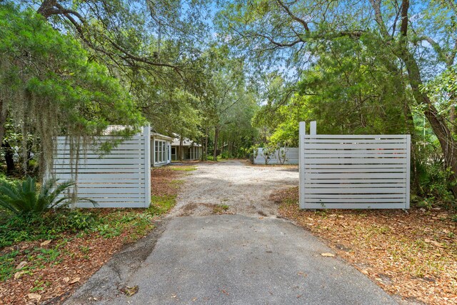 180 E Mitchell Ave, Santa Rosa Beach, FL 32459 - view of asphalt driveway