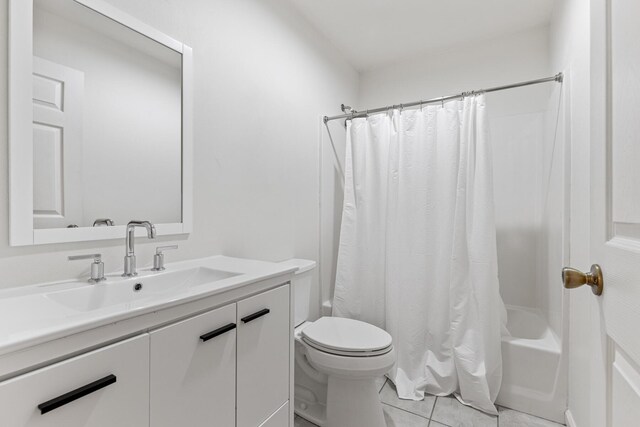 180 E Mitchell Ave, Santa Rosa Beach, FL 32459 - bathroom with vanity, shower / bath combination with curtain, toilet, and tile patterned floors