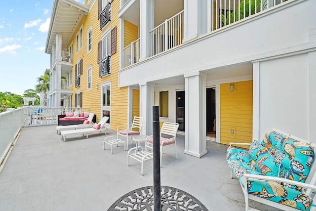 9100 Baytowne Wharf Blvd Unit 261, Miramar Beach, FL 32550 - view of patio featuring an outdoor living space