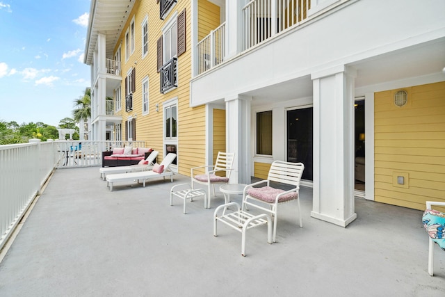 9100 Baytowne Wharf Blvd Unit 261, Miramar Beach, FL 32550 - view of patio with outdoor lounge area