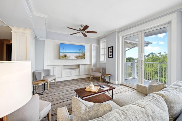 9100 Baytowne Wharf Blvd Unit 261, Miramar Beach, FL 32550 - living area with crown molding and a ceiling fan