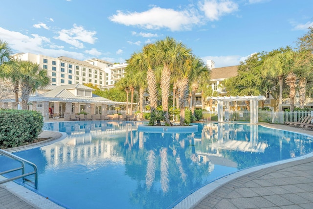 9100 Baytowne Wharf Blvd Unit 261, Miramar Beach, FL 32550 - community pool featuring a pergola and a patio