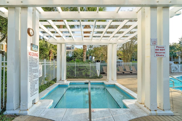 9100 Baytowne Wharf Blvd Unit 261, Miramar Beach, FL 32550 - view of swimming pool featuring a pool and a pergola