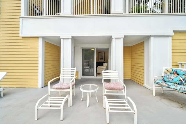 9100 Baytowne Wharf Blvd Unit 261, Miramar Beach, FL 32550 - view of patio with a balcony