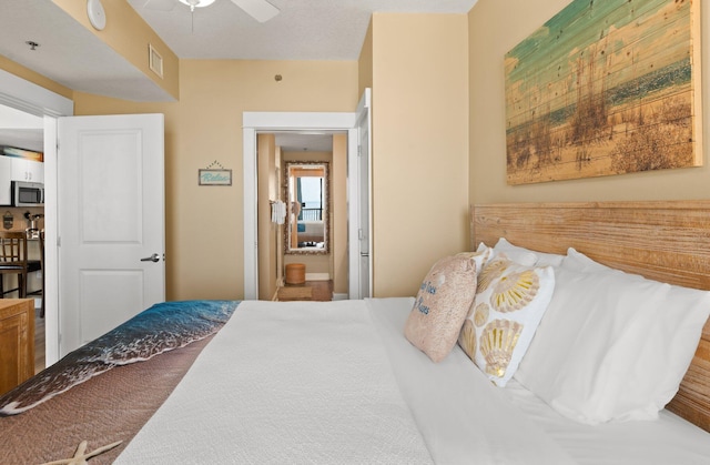 11800 Front Beach Rd Unit 1301, Panama City Beach, FL 32407 - bedroom with ceiling fan