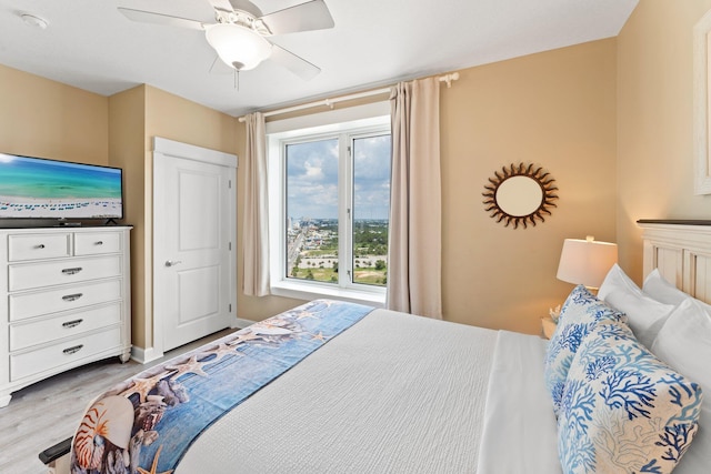 11800 Front Beach Rd Unit 1301, Panama City Beach, FL 32407 - bedroom featuring light wood finished floors and ceiling fan